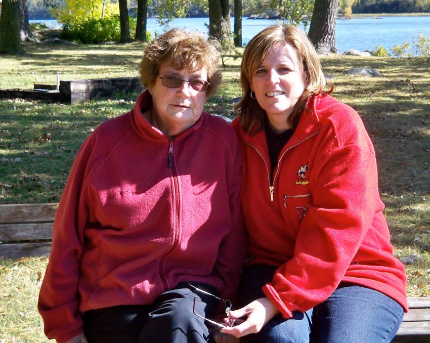 Kathy Scheving and her mother sharing time by the lake.