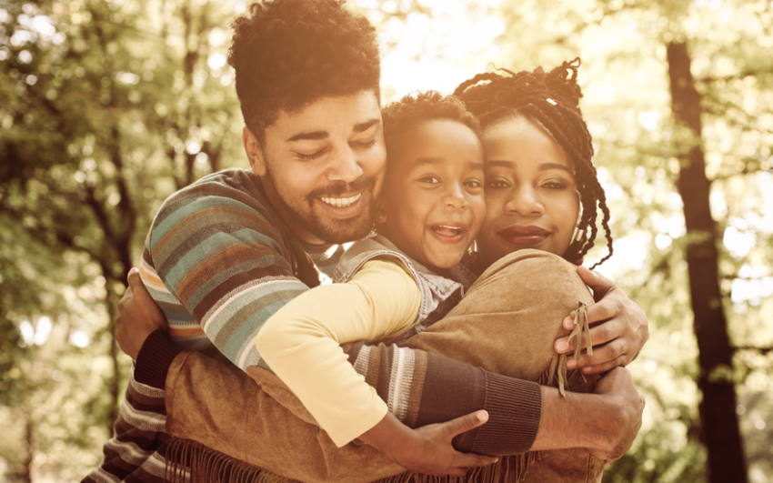 Loving family embracing tightly