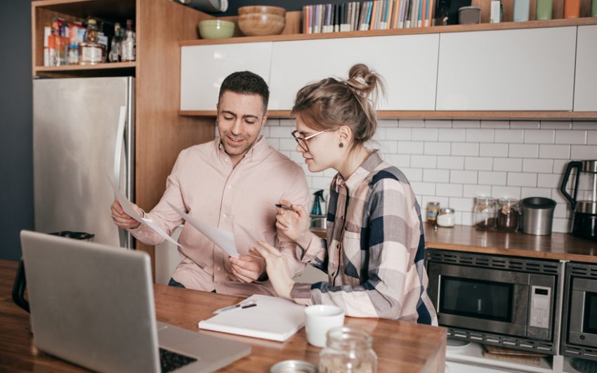 Young couple looking at paperwork