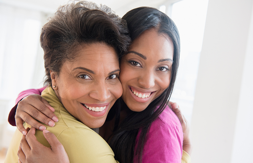 Mother and daughter in a warm embrace